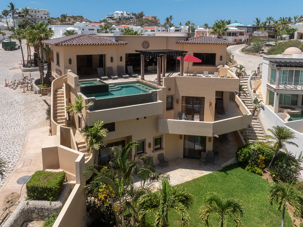 Los Cabos Pedregal Csl Casa Agave presents a rare invitation to experience the raw beauty and vibrant life of the Pacific Ocean from a residence of contemporary distinction. Designed for those who seek both serene sanctuary and moments of shared delight, this seven-bedroom oceanfront home offers an unparalleled connection to the stunning Los Cabos coast.Imagine waking to the sound of waves, the horizon a canvas for breathtaking sunrises. At Casa Agave, the expansive living spaces seamlessly merge with the coastal landscape, offering uninterrupted for sale