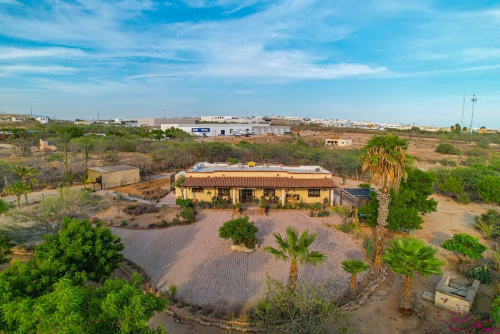 Los Cabos Jacarandas This is ideal for a New owner who wants to stay away from HOA, with over 30,000 sf tq of land and a Cozy Home by now one of the main streets with huge value New Pueblo Bonito Street via jacarandas on the north of Cabo near new plazas and stores.also ideal for a Developer for commercial or Residential projectMotivated for sale