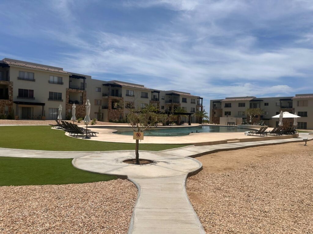 Los Cabos Camino Del Mar Ground-Floor Condo | La Joya at Camino del Mar, El TezalDiscover the perfect blend of comfort, convenience, and investment potential in this beautiful ground-floor condominium located in the highly sought-after La Joya Residences, within the master-planned community of Camino del Mar in El Tezal, one of Los Cabos' fastest-growing and highest-appreciating neighborhoods.This thoughtfully designed residence features:* 2 spaci ous bedrooms* 2 full bathrooms* TV / Family Room* Ground-floor location with direct access to the pool* Swimming pool right in front of your terraceResidents also enjoy exclusive resort-style amenities, including:✔️ Semi-Olympic swimming pool✔️ Fully equipped fitness center✔️ Kids' Park✔ – Maldivas, Cabo Corridor, BS